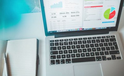 Financial analyst reviewing market reports.